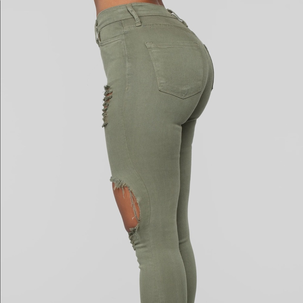Green glistening ripped jean denim